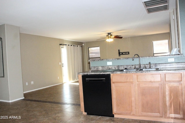 kitchen featuring ceiling fan, black dishwasher, sink, and light brown cabinetry