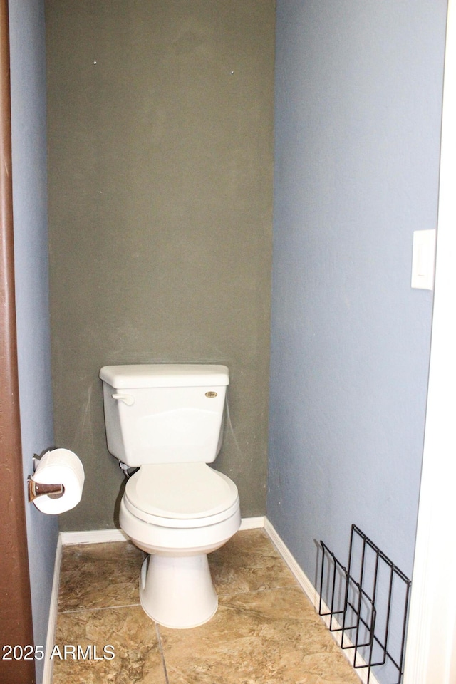 bathroom featuring toilet