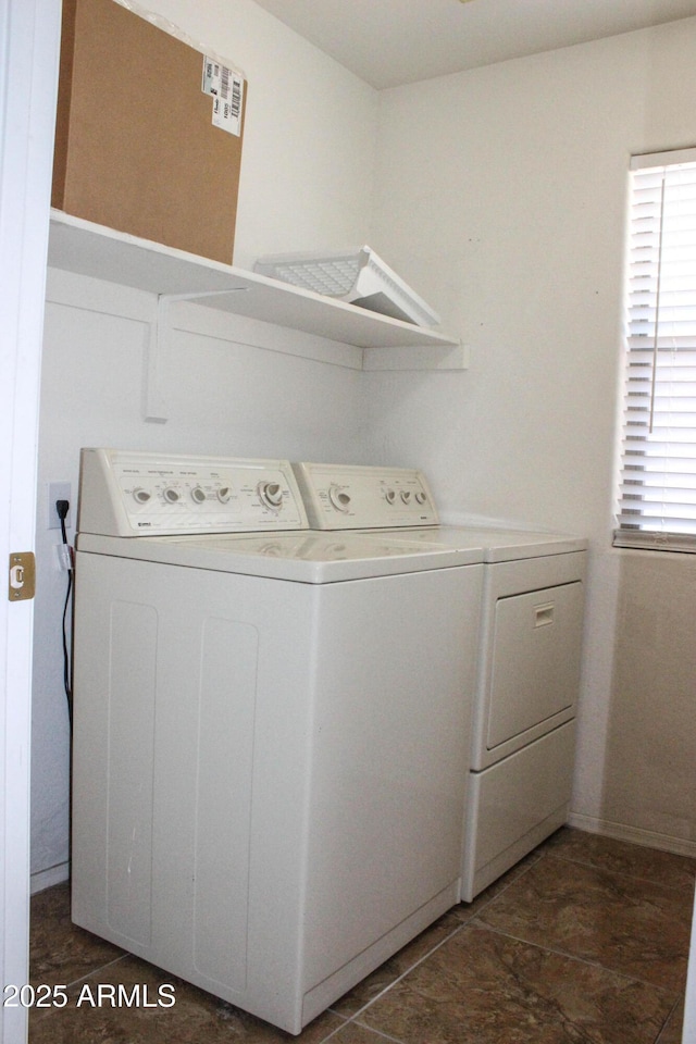 laundry room featuring washer and dryer