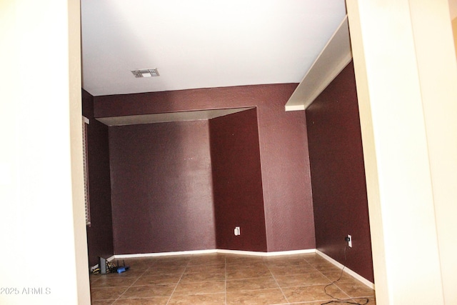 view of tiled spare room