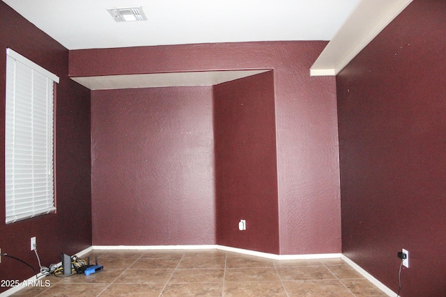 view of tiled spare room