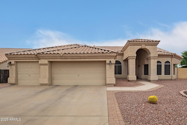 3946 N 112th Ave, Avondale, AZ 85392 - view of front of property featuring a garage, driveway, stucco siding, and a tiled roof