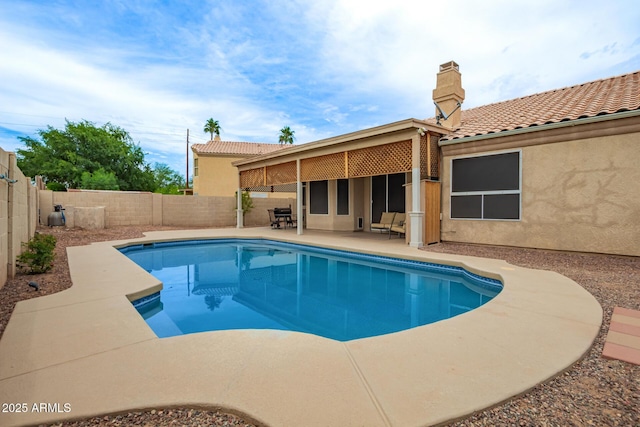 3946 N 112th Ave, Avondale, AZ 85392 - view of swimming pool featuring a patio and a fenced backyard