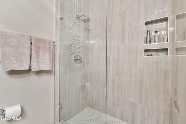 bathroom featuring walk in shower