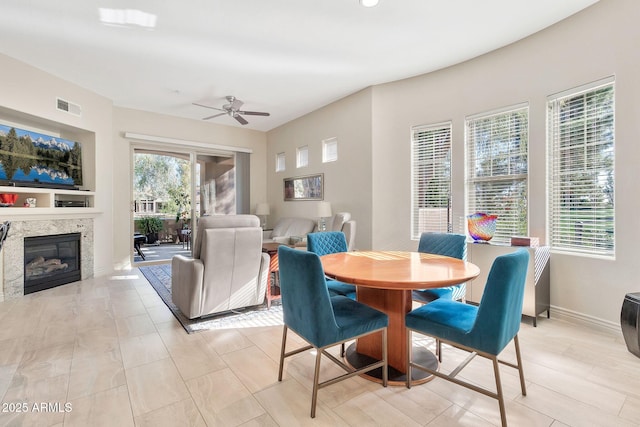 dining area with ceiling fan