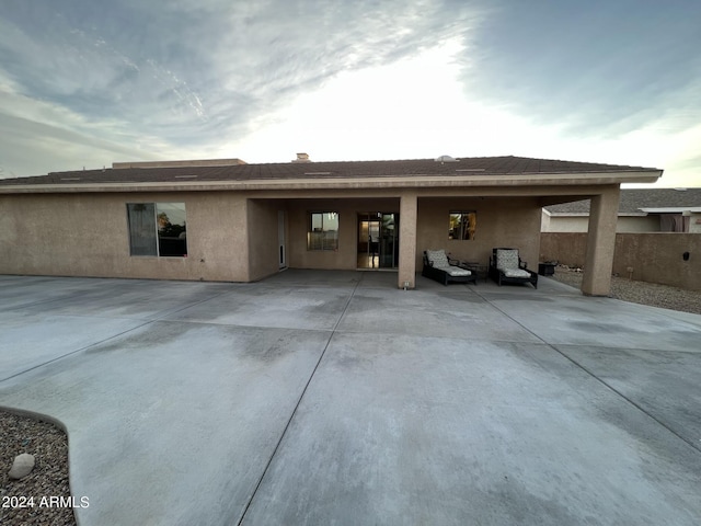 rear view of house with a patio area