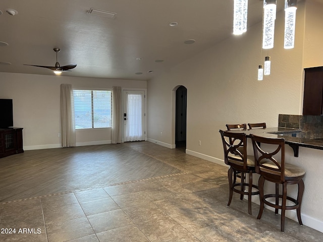 living room featuring ceiling fan