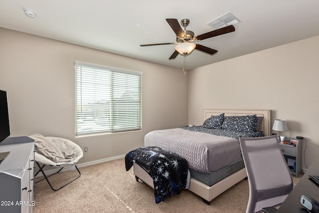 3929 S 79th Ln, Phoenix, AZ 85043 - bedroom with visible vents, baseboards, a ceiling fan, and carpet