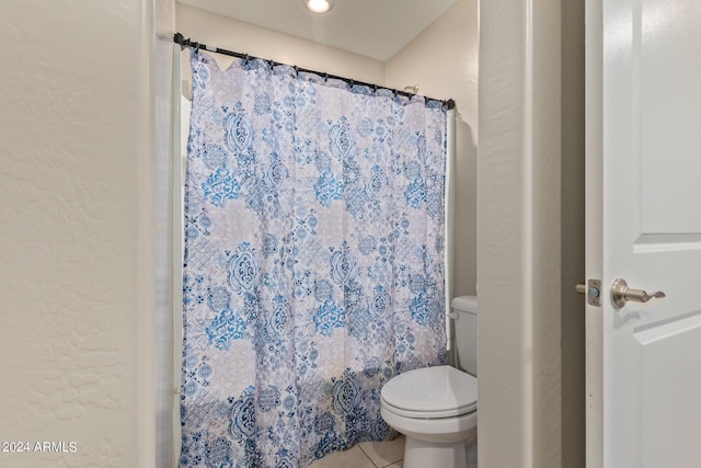 3929 S 79th Ln, Phoenix, AZ 85043 - full bath featuring toilet, tile patterned floors, and a shower with shower curtain