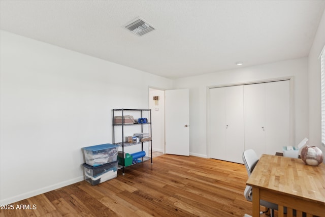 home office featuring wood-type flooring