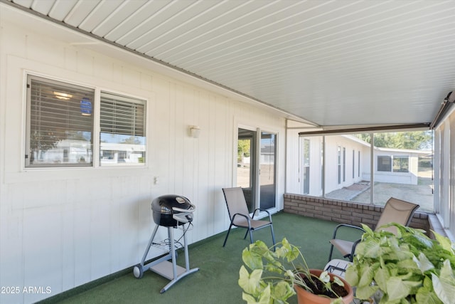 sunroom / solarium featuring plenty of natural light