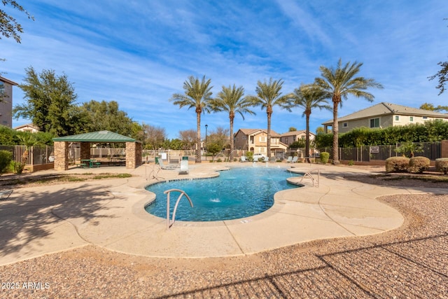 view of pool featuring a gazebo, a patio area, and pool water feature