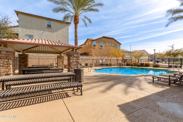 view of swimming pool featuring a gazebo and a patio