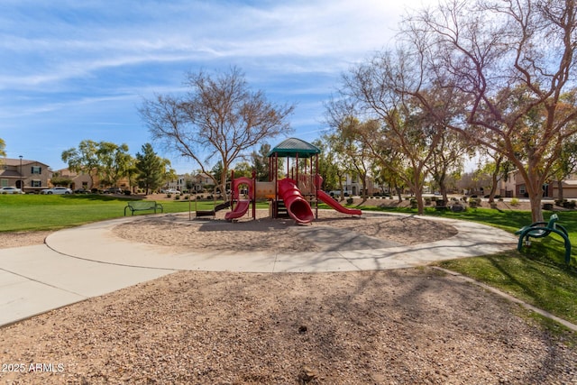 view of jungle gym with a lawn