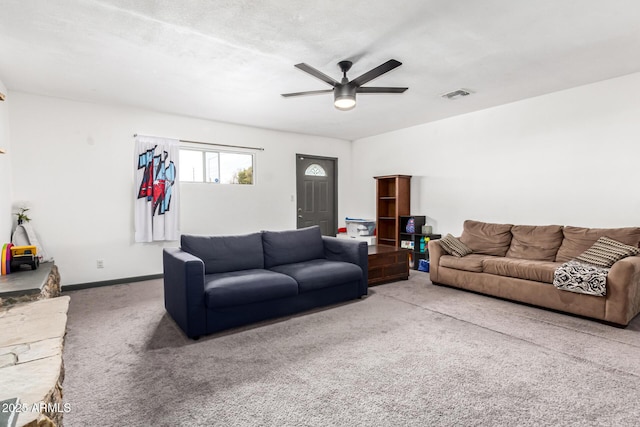 living room with carpet floors and ceiling fan