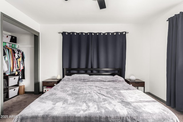 carpeted bedroom with ceiling fan and a closet