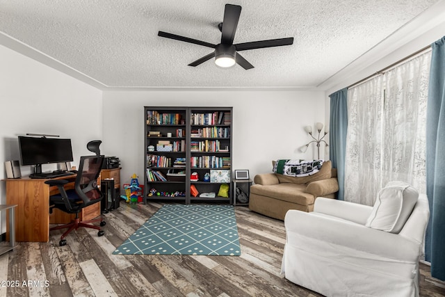 office with ceiling fan, wood-type flooring, and a textured ceiling