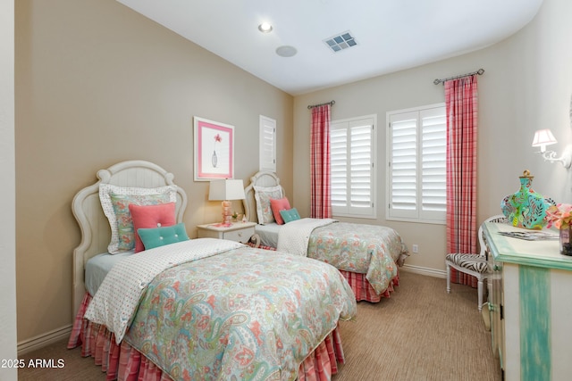 bedroom featuring baseboards, recessed lighting, visible vents, and light colored carpet