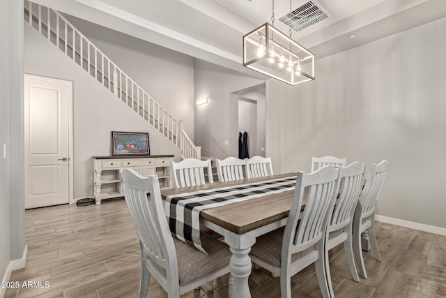 dining area featuring a chandelier