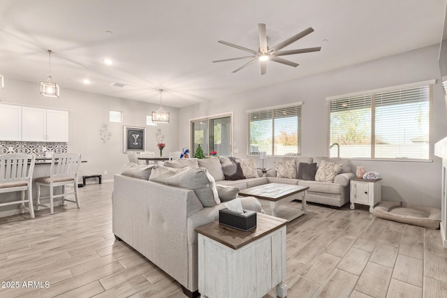 living room featuring ceiling fan