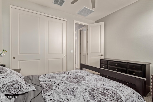 bedroom featuring ceiling fan and a closet