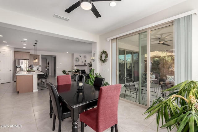 dining space featuring recessed lighting, ceiling fan, visible vents, and light tile patterned flooring