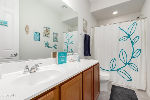 full bath with visible vents, a shower with shower curtain, toilet, tile patterned floors, and vanity