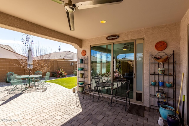 view of patio / terrace with outdoor dining area and a fenced backyard