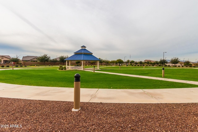 surrounding community featuring a yard and a gazebo