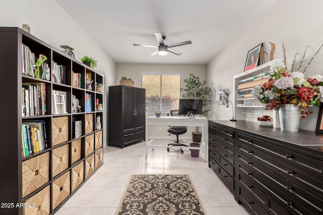 office space with light tile patterned floors and ceiling fan