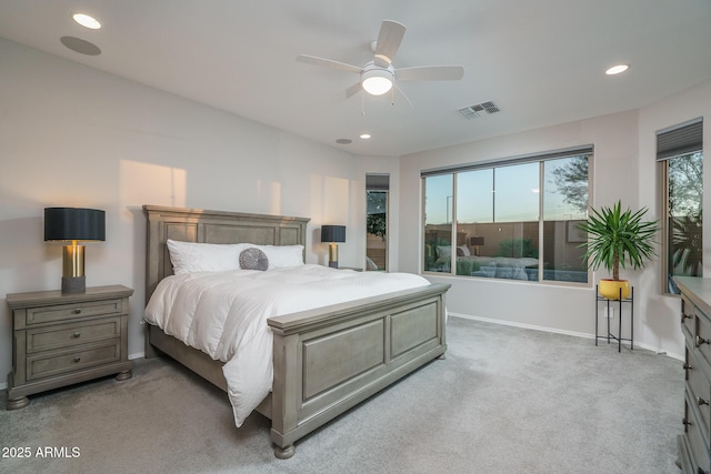 carpeted bedroom with ceiling fan