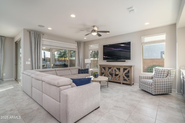 living room with ceiling fan