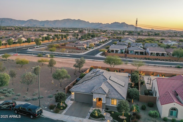 aerial view at dusk with a mountain view