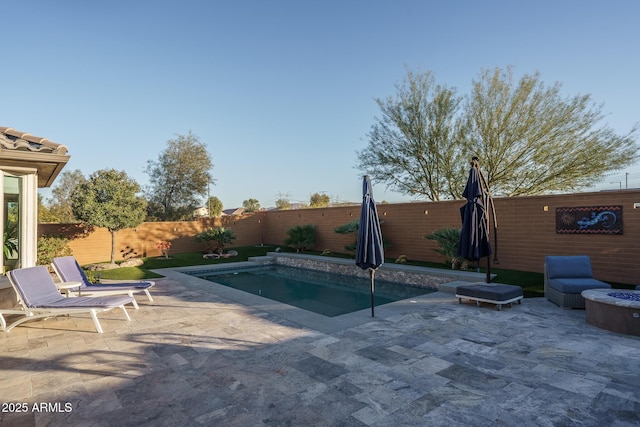 view of pool with a patio