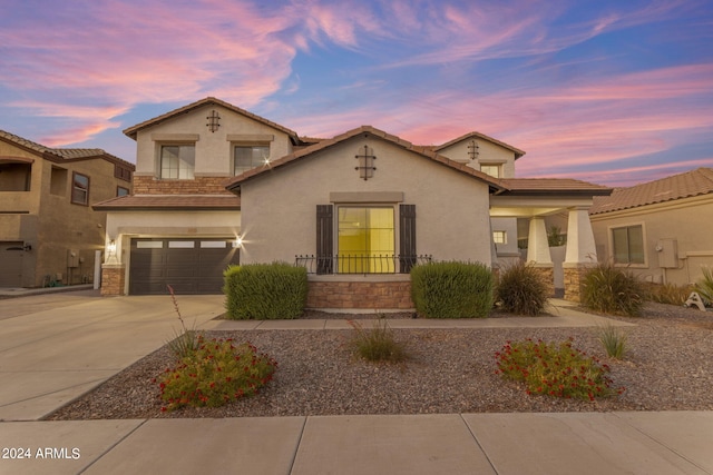 view of front of house with a garage