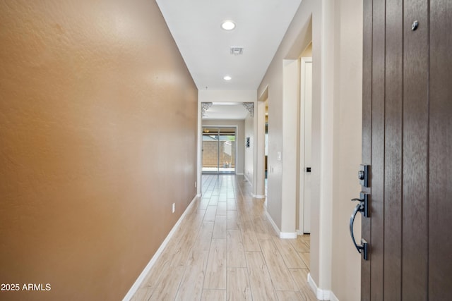 9921 E Acceleration Dr, Mesa, AZ 85212 - hallway with baseboards, light wood-style flooring, and recessed lighting