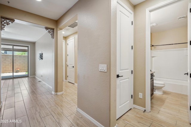 9921 E Acceleration Dr, Mesa, AZ 85212 - hall with wood finish floors and baseboards
