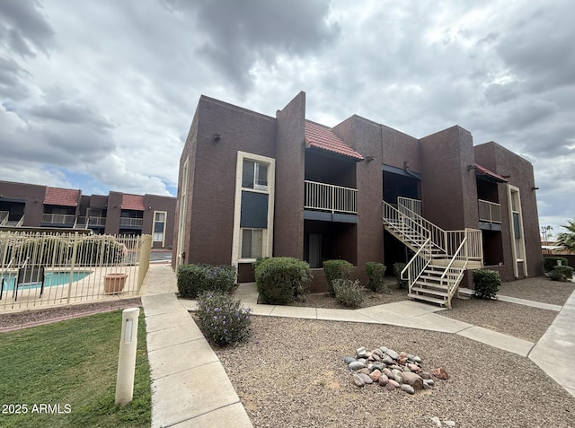 16602 N 25th St Unit 217, Phoenix, AZ 85032 - view of property featuring fence