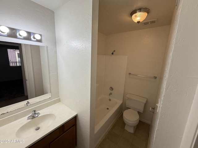 16602 N 25th St Unit 217, Phoenix, AZ 85032 - bathroom featuring tile patterned floors, toilet, vanity, a textured wall, and bathing tub / shower combination