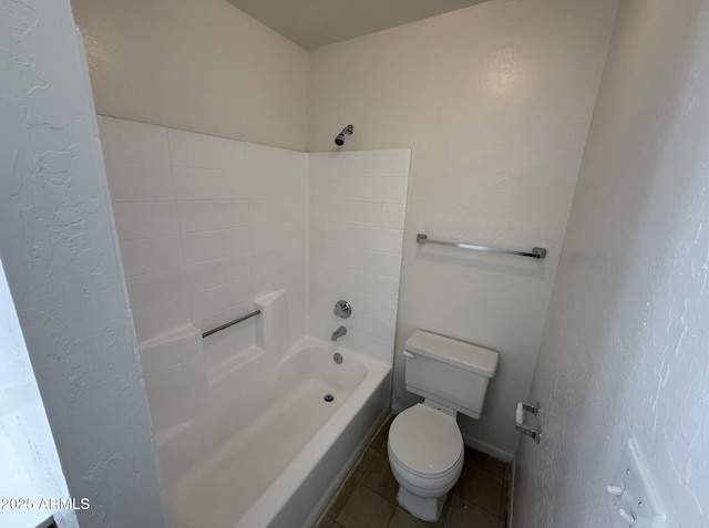 16602 N 25th St Unit 217, Phoenix, AZ 85032 - full bath featuring tile patterned flooring, toilet,  shower combination, and baseboards