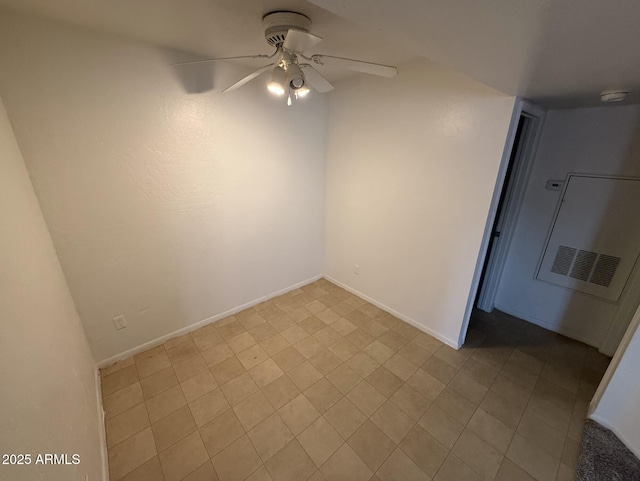 16602 N 25th St Unit 217, Phoenix, AZ 85032 - spare room featuring ceiling fan, a smoke detector, baseboards, and light tile patterned flooring