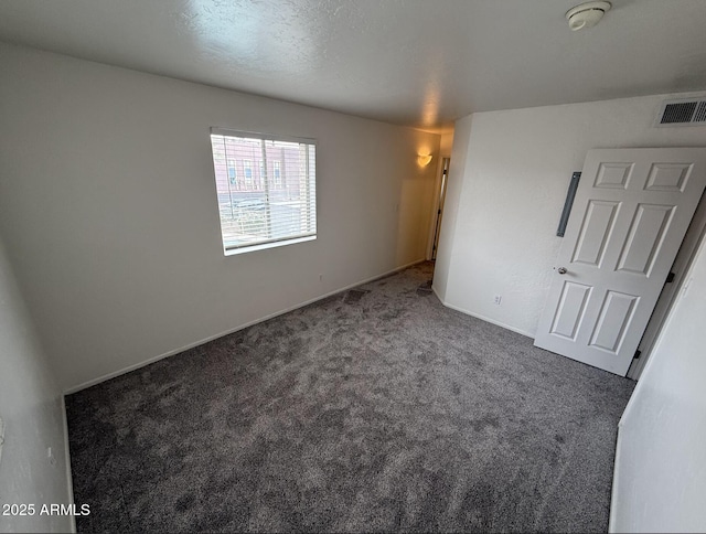 16602 N 25th St Unit 217, Phoenix, AZ 85032 - unfurnished bedroom featuring carpet and baseboards