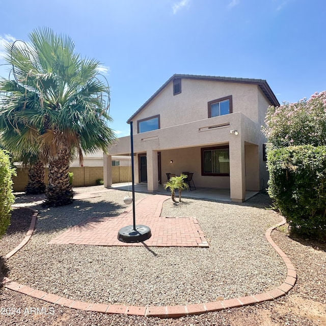 rear view of house with a patio area