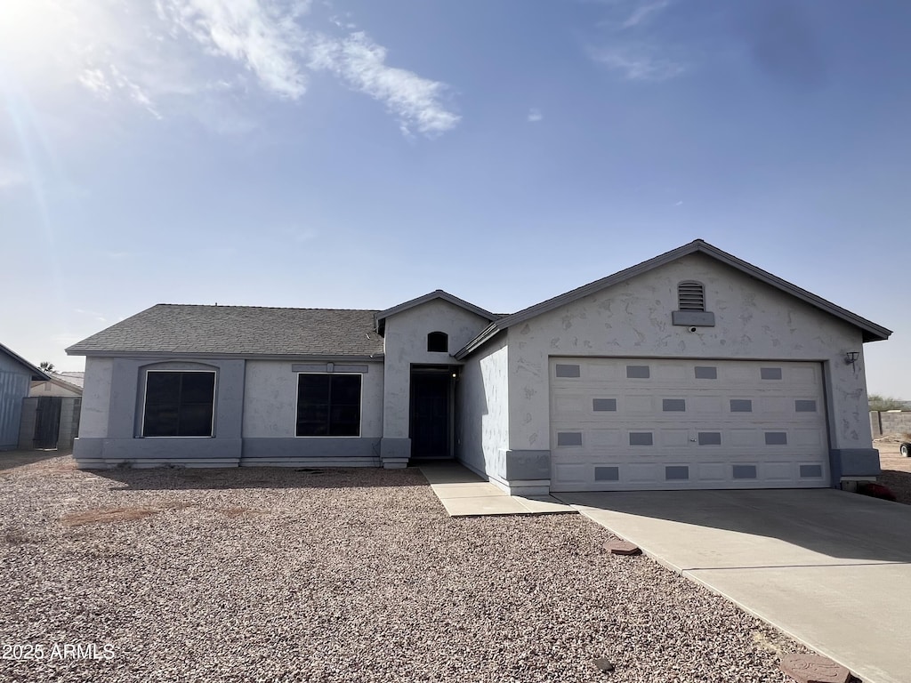 ranch-style house with a garage