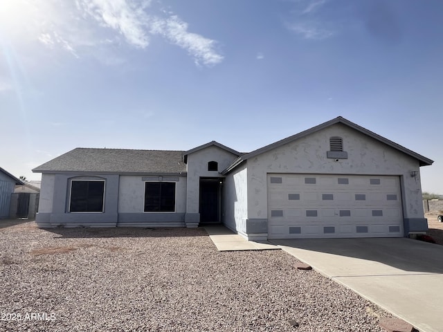 ranch-style house with a garage