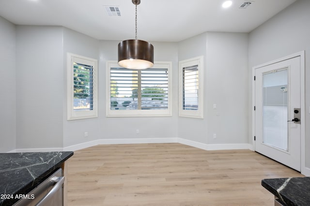 dining room featuring light wood-type flooring