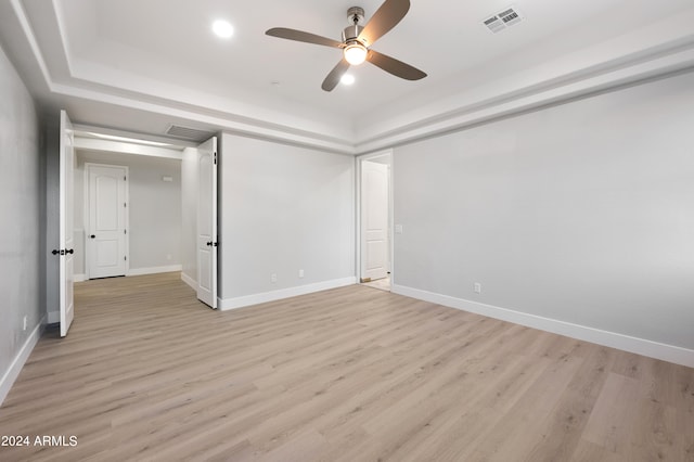 unfurnished bedroom featuring light hardwood / wood-style floors and ceiling fan