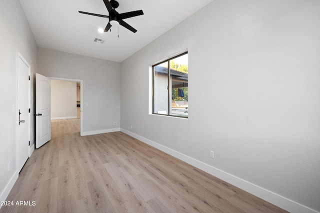 unfurnished bedroom featuring light wood-type flooring and ceiling fan