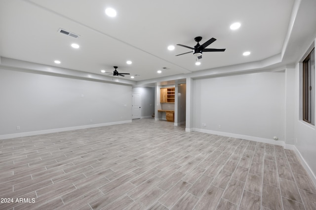 interior space with ceiling fan and light wood-type flooring