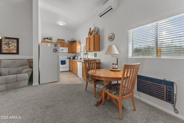 dining room with heating unit, baseboards, a wall mounted AC, light tile patterned flooring, and light colored carpet